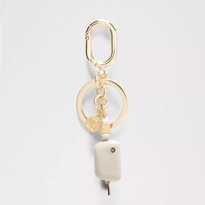 LULULEMON Everywhere Belt Bag Charm Keychain Butter Cream/Gold